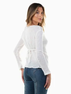 Blusa texturizada manga comprida