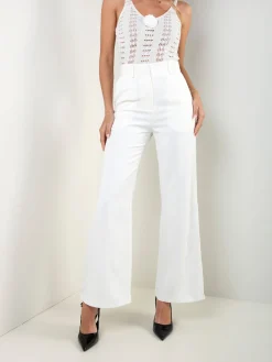 Calças alfaiataria com bolsos