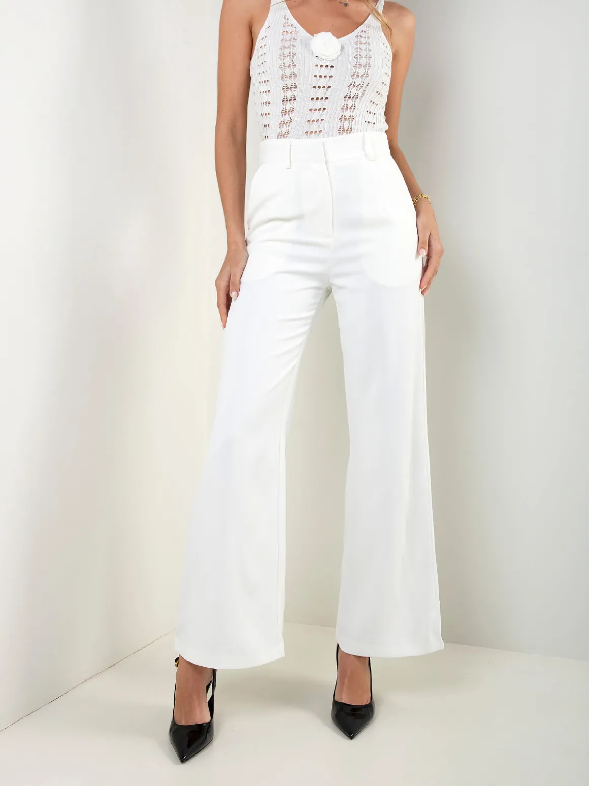 Calças alfaiataria com bolsos