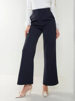 Calças alfaiataria com bolsos