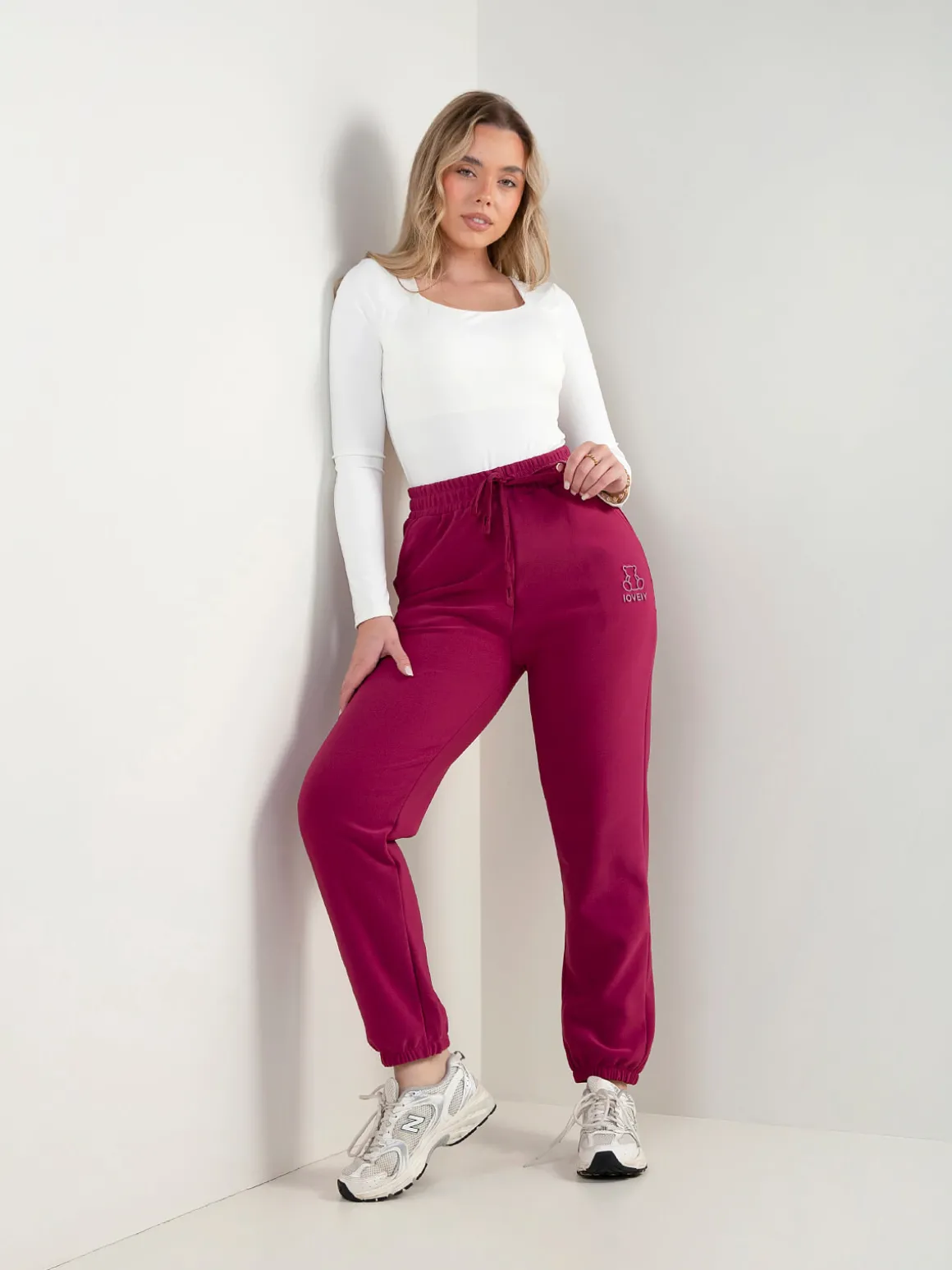 Calças com bordado urso