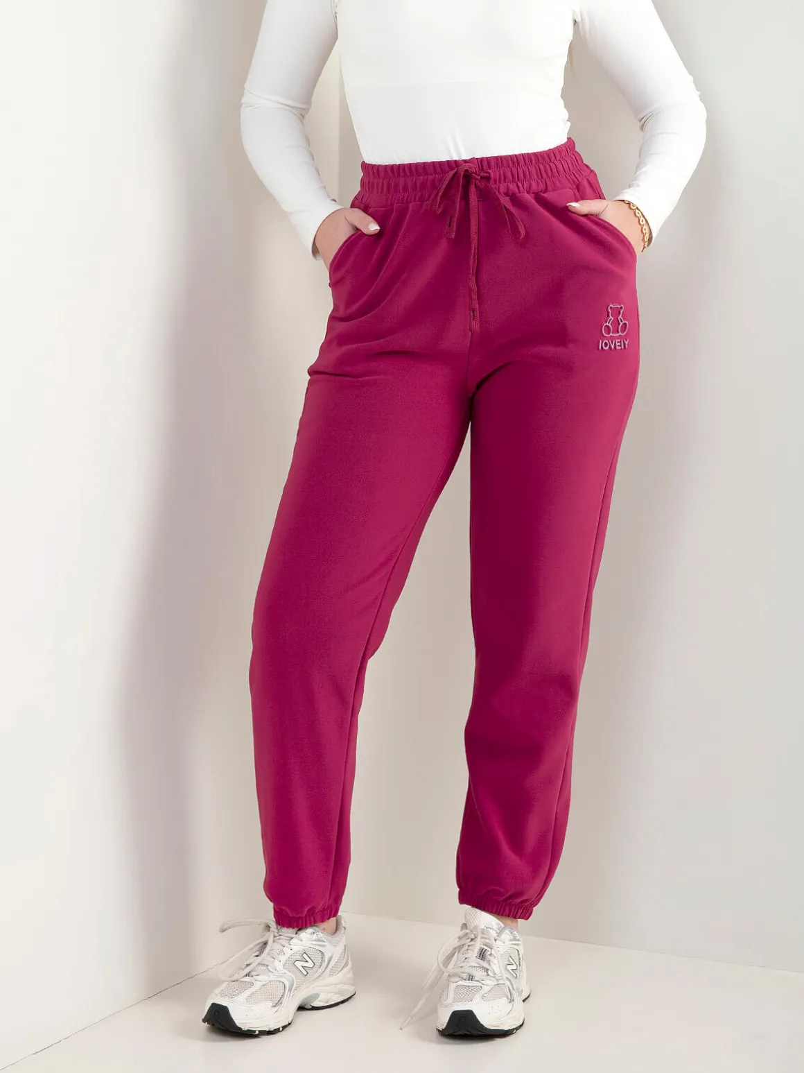 Calças com bordado urso