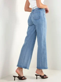 Calças de ganga largas com renda