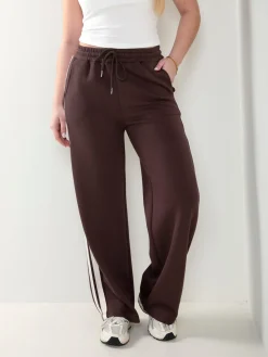 Calças desportivas com faixa lateral