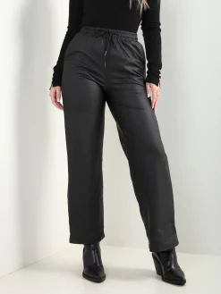 Calças efeito pele cintura elástica