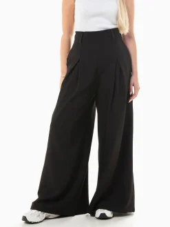 Calças elegantes wide leg com pinças