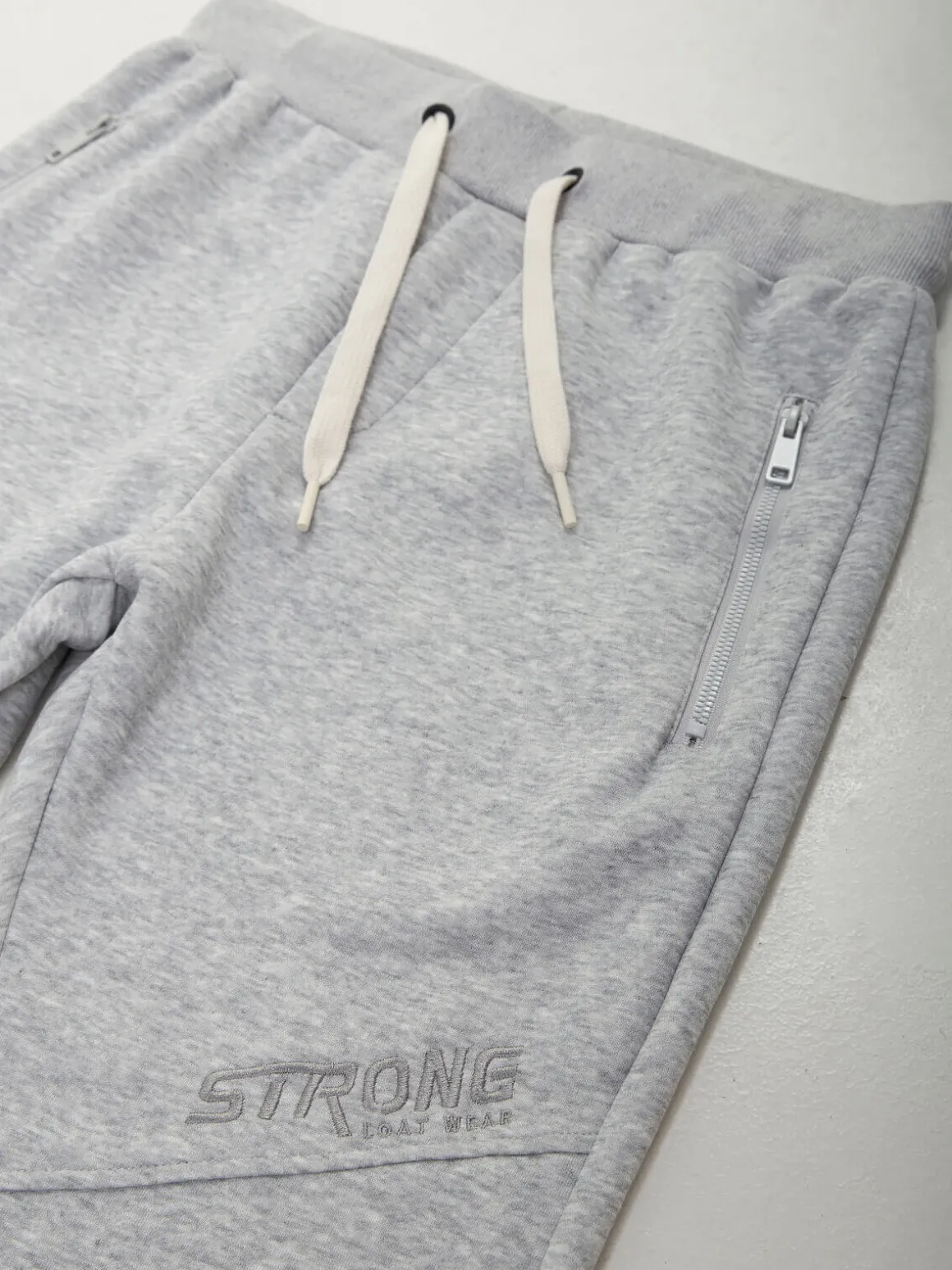 Calças fato treino com bordado