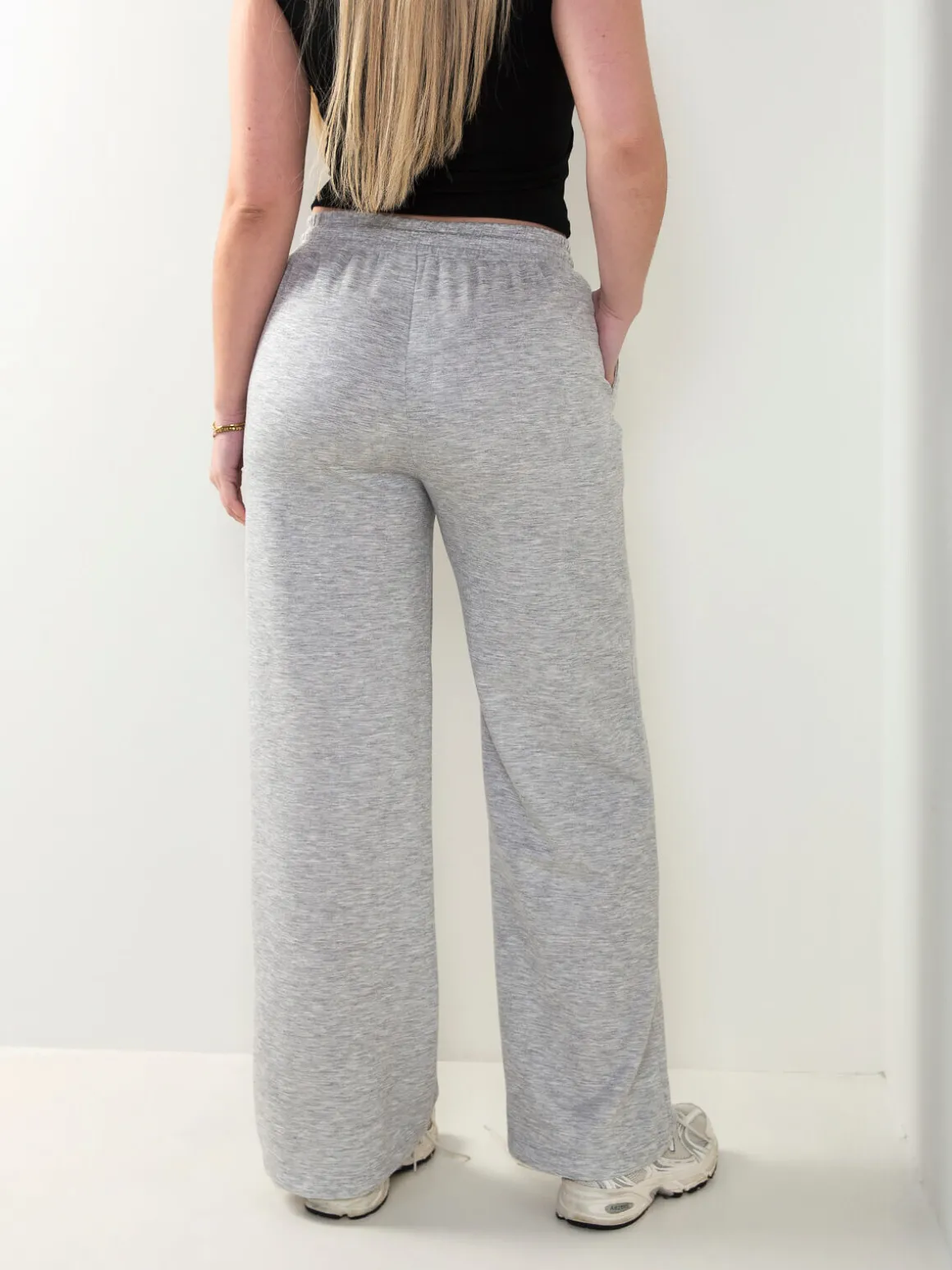 Calças fato treino com costura frontal