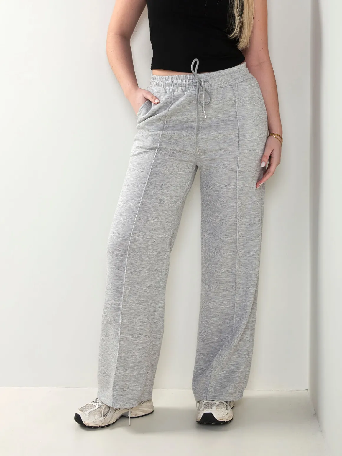 Calças fato treino com costura frontal