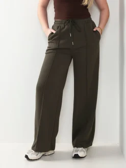 Calças fato treino com costura frontal