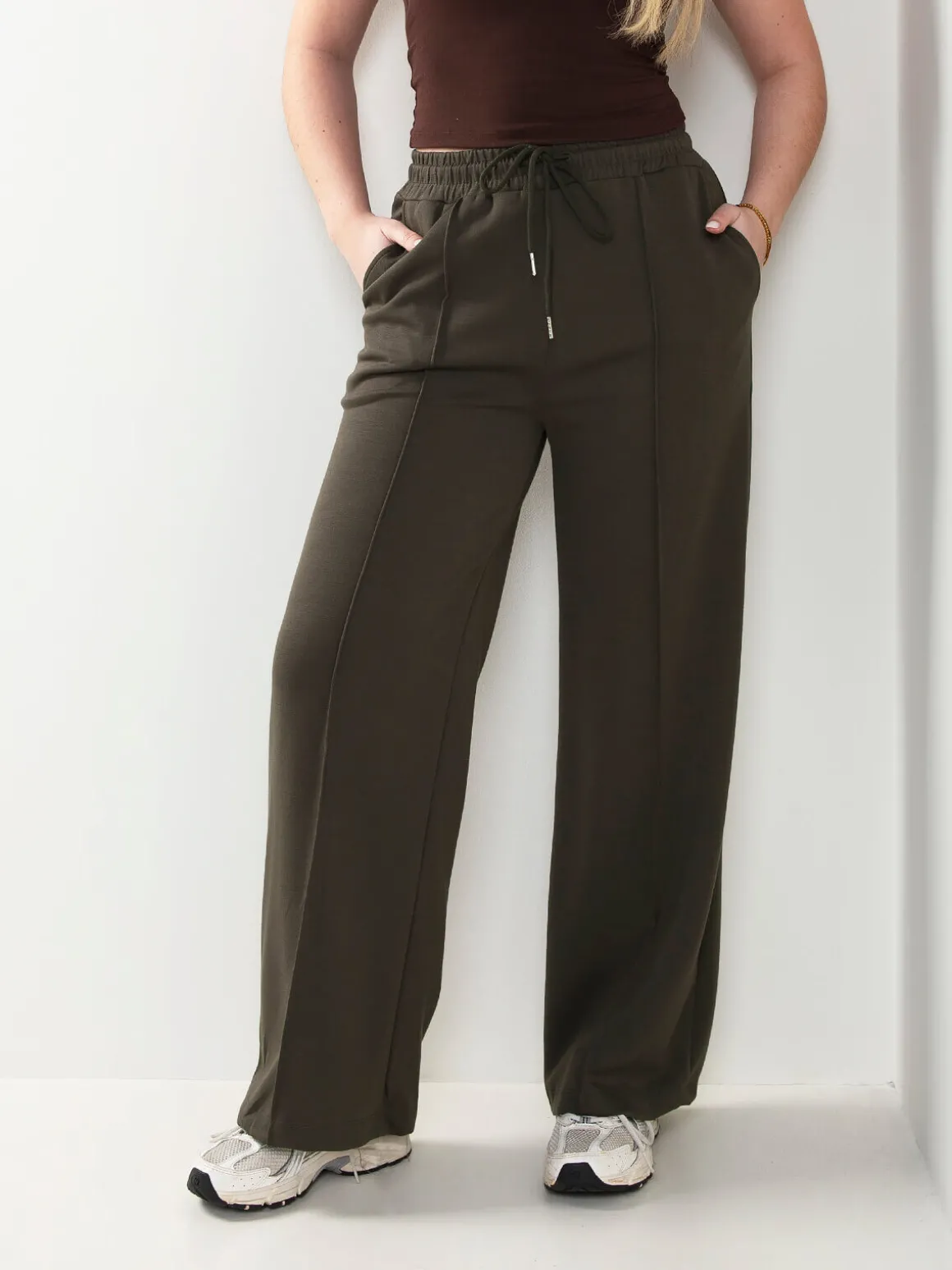 Calças fato treino com costura frontal