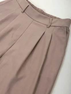 Calças fluídas cintura alta