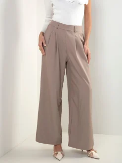 Calças fluídas cintura alta