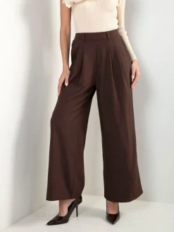 Calças fluídas cintura alta