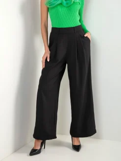 Calças fluídas cintura alta