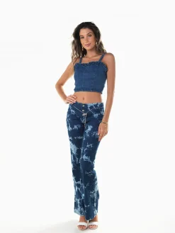 Calças ganga flare manchadas