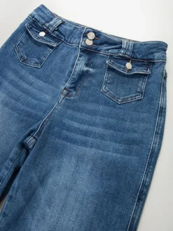 Calças ganga largas com bolsos