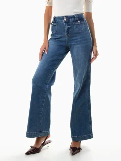 Calças ganga largas com bolsos