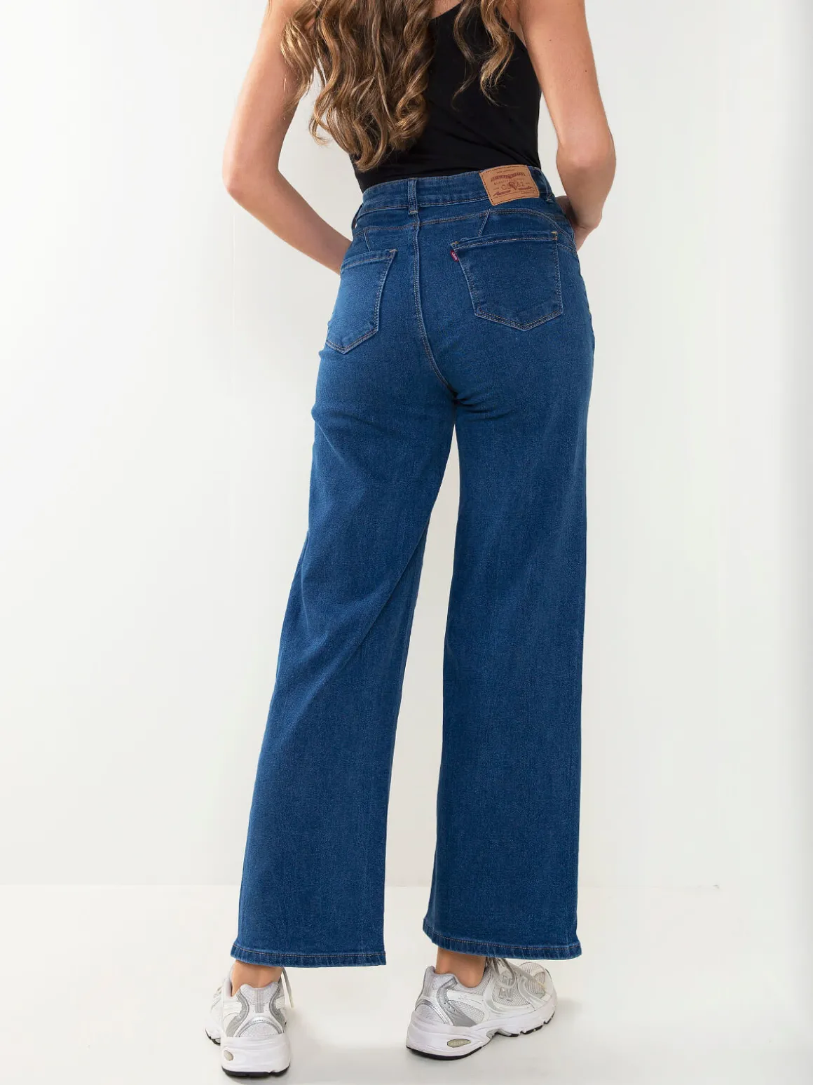 Calças ganga largas com bolsos