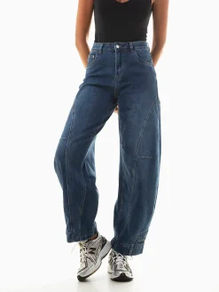 Calças ganga skater com costuras