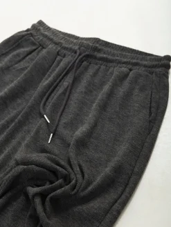 Calças jogger em malha canelada