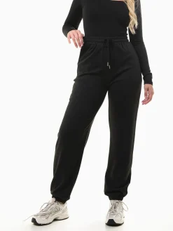 Calças jogger em malha canelada