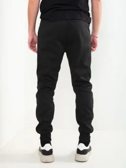 Calças jogger pretas com estampado