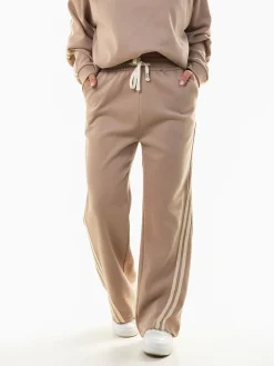 Calças largas riscas laterais