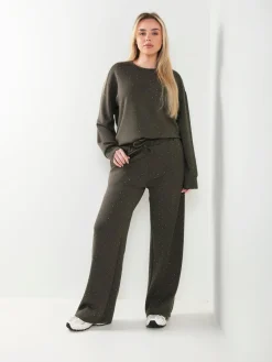 Calças malha com strass