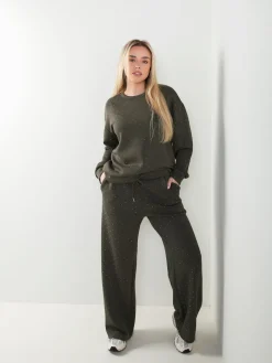 Calças malha com strass