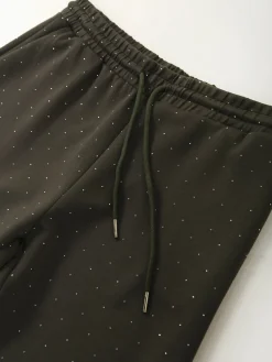 Calças malha com strass