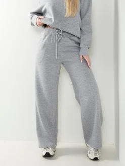 Calças malha com strass