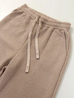 Calças malha com textura