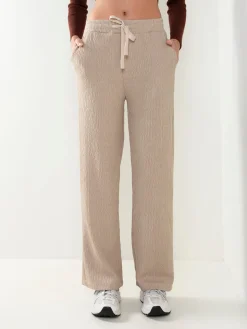 Calças malha com textura