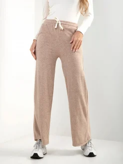 Calças malha efeito aveludado cintura alta