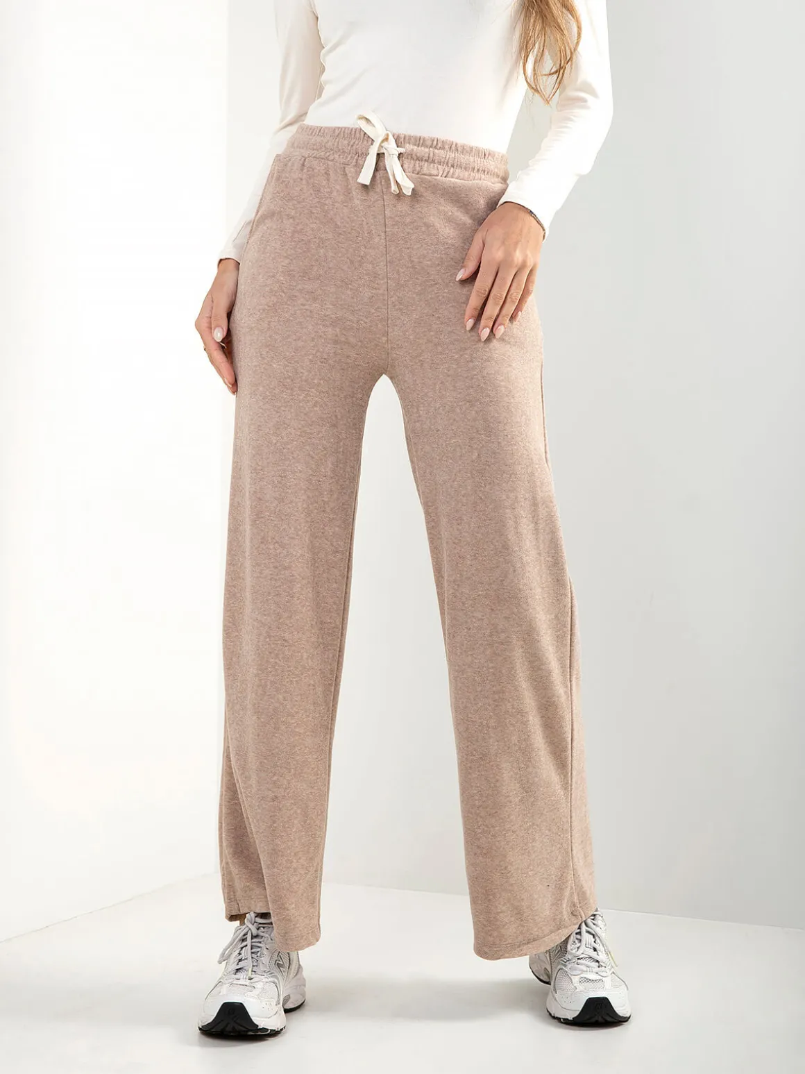 Calças malha efeito aveludado cintura alta