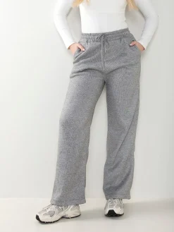 Calças malha nervuras interior polar