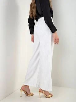 Calças wide leg riscas diplomáticas