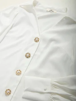 Camisa acetinada com manga abalonada