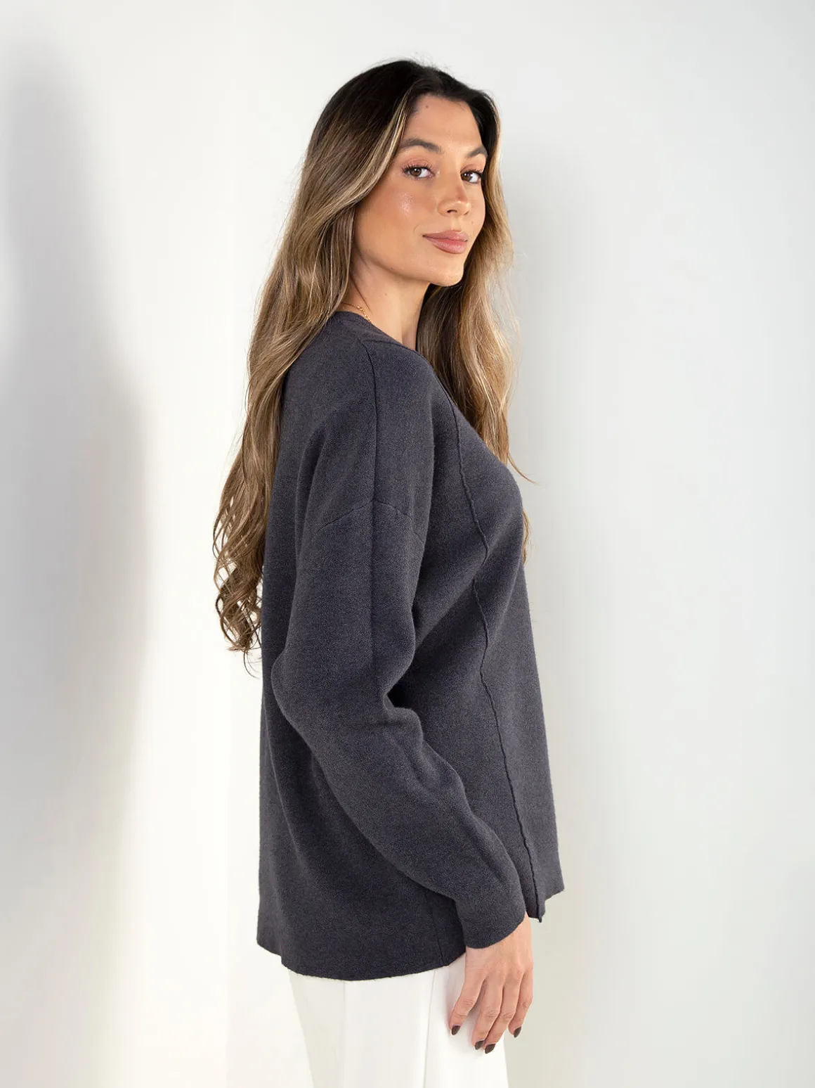 Camisola malha com bolso em brilho