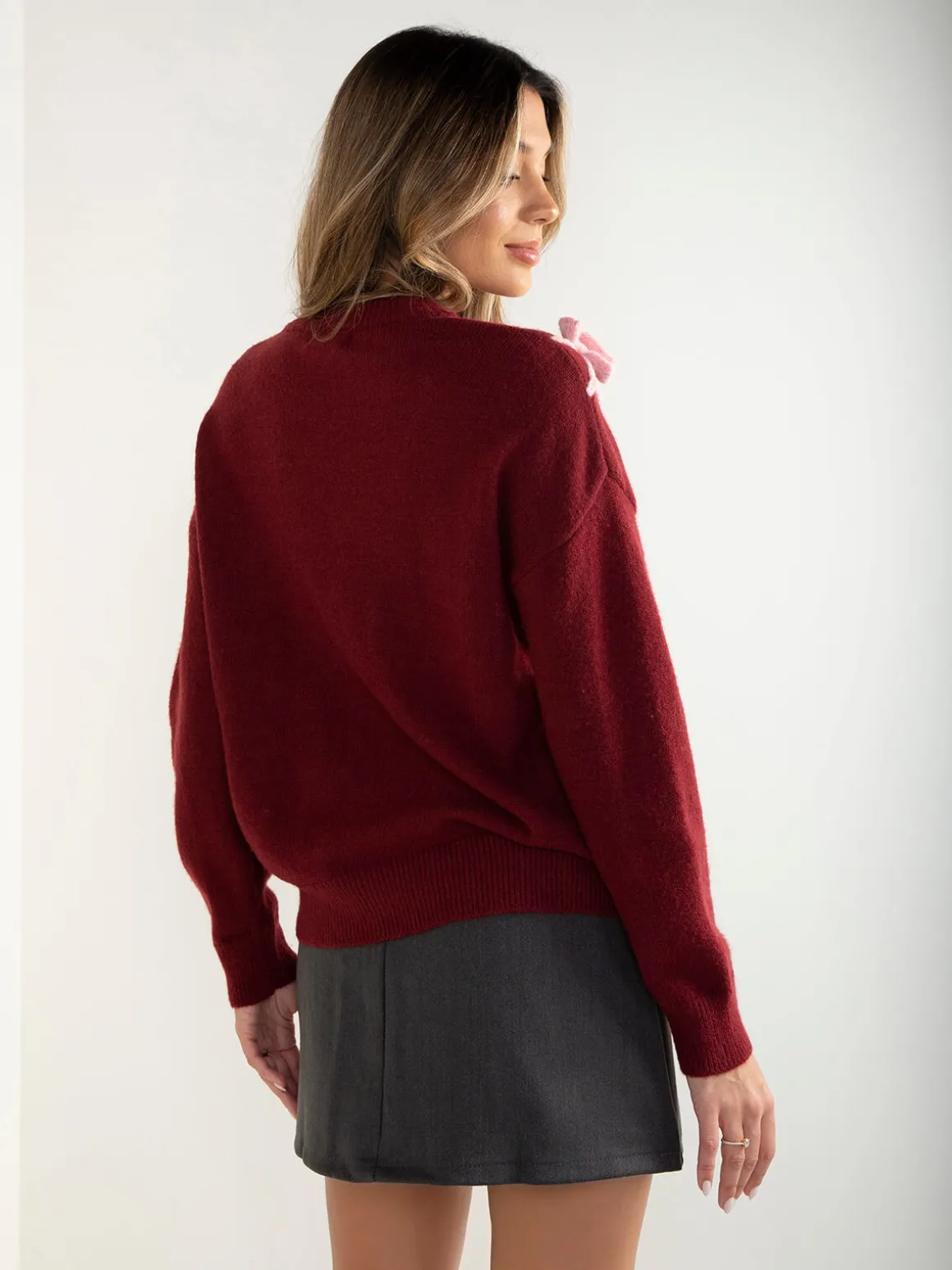 Camisola malha com laços aplicados