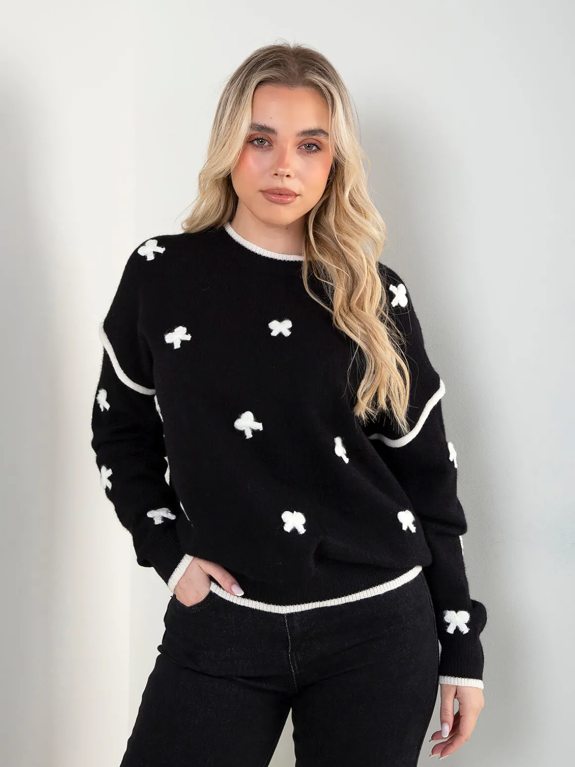 Camisola malha com laços aplicados