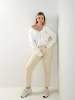 Camisola malha em V com botões dourados