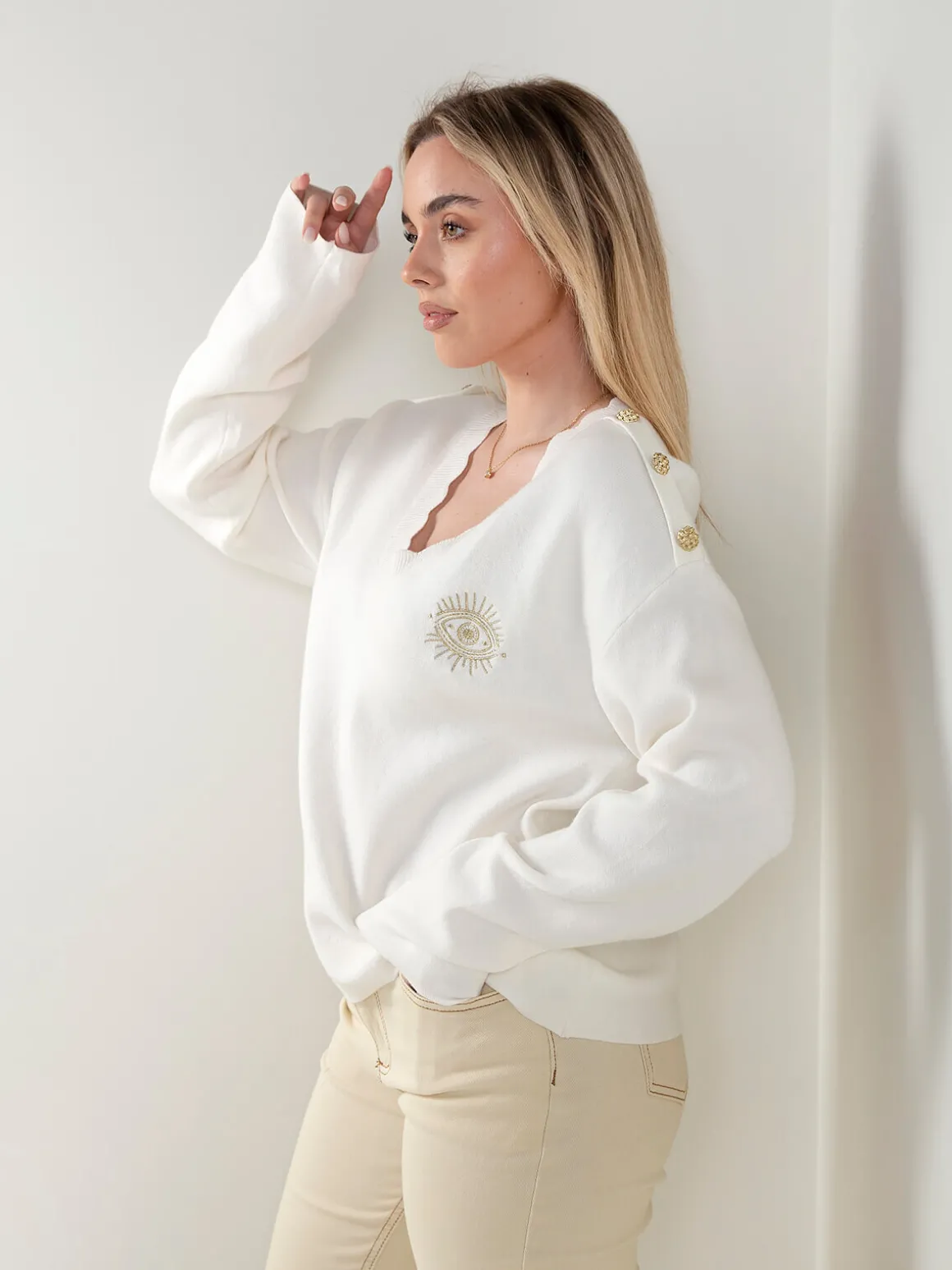 Camisola malha em V com botões dourados