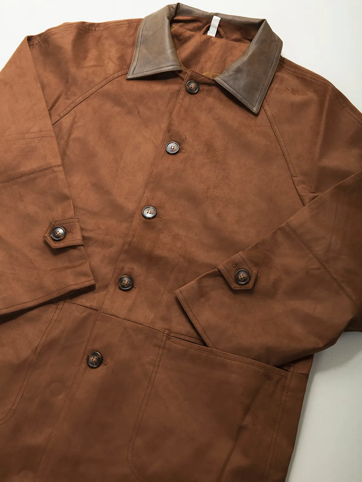 Casaco comprido efeito camurça