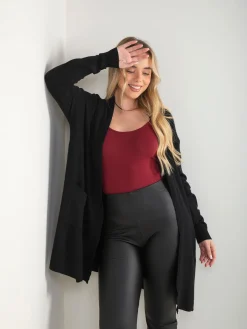 Casaco de malha estruturada com bolsos