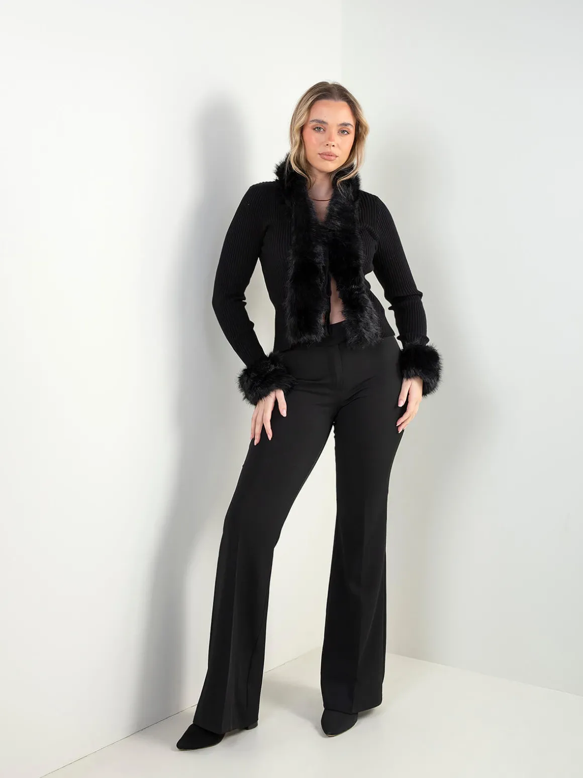 Casaco malha canelada com pelo