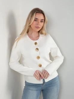 Casaco malha com botões dourados