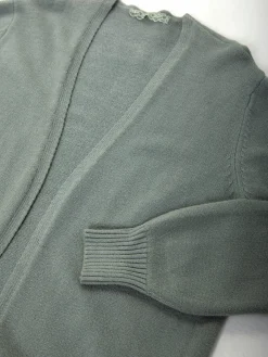 Casaco malha comprido com bolsos