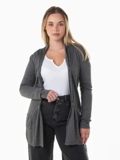 Casaco malha comprido com bolsos